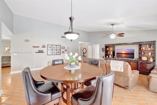 11955 Brim Way, Cooper City, FL 33026 - dining space with vaulted ceiling, ceiling fan, and light tile patterned floors