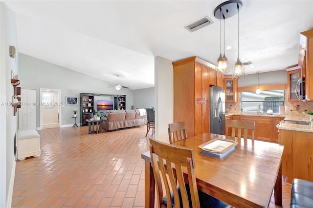 11955 Brim Way, Cooper City, FL 33026 - dining space featuring brick flooring, ceiling fan, and lofted ceiling
