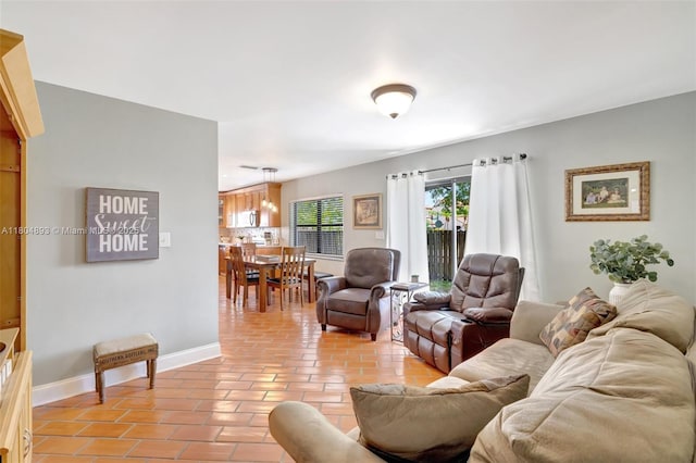 11955 Brim Way, Cooper City, FL 33026 - living area featuring baseboards and light tile patterned floors