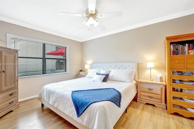 11955 Brim Way, Cooper City, FL 33026 - bedroom with light wood-style flooring, ornamental molding, ceiling fan, and a textured ceiling