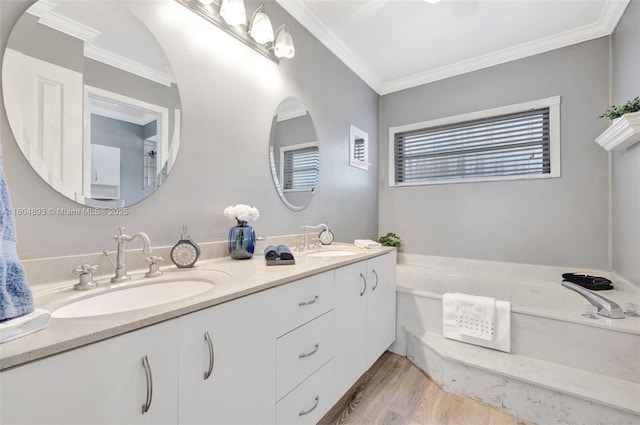 11955 Brim Way, Cooper City, FL 33026 - bathroom featuring double vanity, a garden tub, wood finished floors, and crown molding