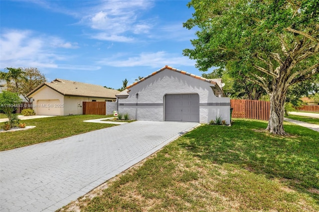 11955 Brim Way, Cooper City, FL 33026 - view of front of property featuring a garage, decorative driveway, and stucco siding