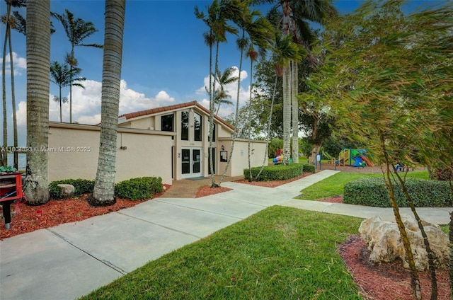 11955 Brim Way, Cooper City, FL 33026 - exterior space with stucco siding and a front yard