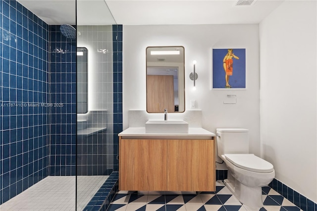 601 NE 1st Ave Unit 2004, Miami, FL 33132 - bathroom with a walk in shower, toilet, vanity, and tile patterned flooring