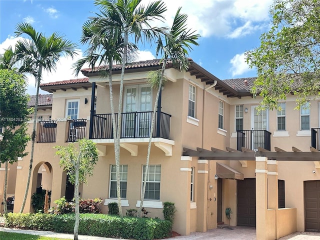 8716 Blaze Ct, Davie, FL 33328 - view of building exterior featuring a garage and driveway