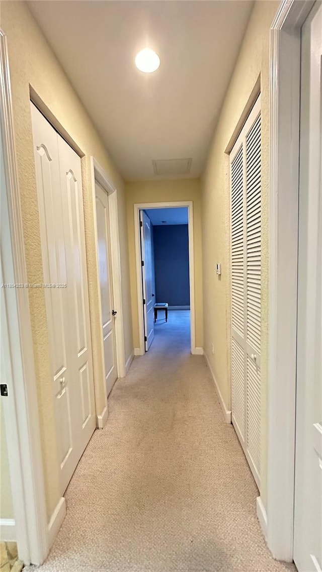 8716 Blaze Ct, Davie, FL 33328 - hallway featuring baseboards and light carpet