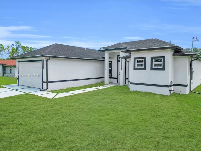 418 8th Ave, Lehigh Acres, FL 33972 - view of front of property featuring an attached garage, stucco siding, a front lawn, and driveway