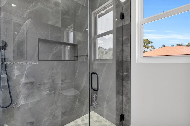 418 8th Ave, Lehigh Acres, FL 33972 - full bath featuring healthy amount of natural light and a marble finish shower