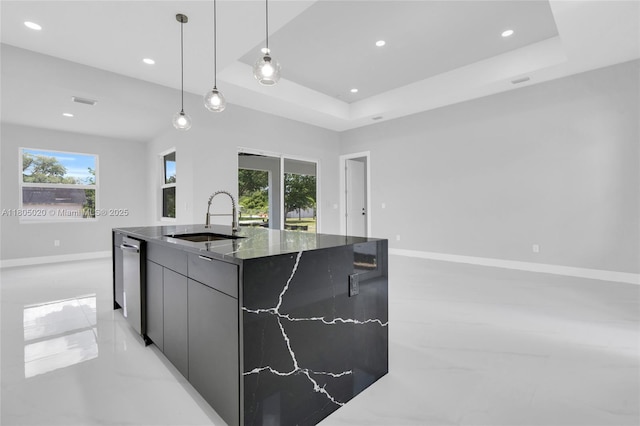 418 8th Ave, Lehigh Acres, FL 33972 - kitchen featuring a sink, modern cabinets, an island with sink, dishwasher, and plenty of natural light