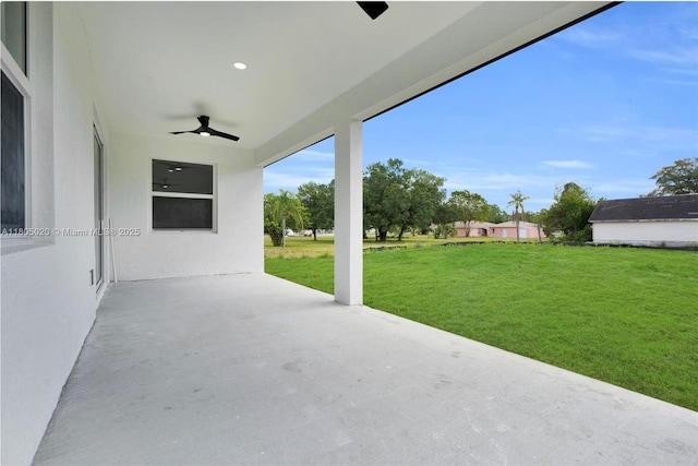 418 8th Ave, Lehigh Acres, FL 33972 - view of patio with ceiling fan