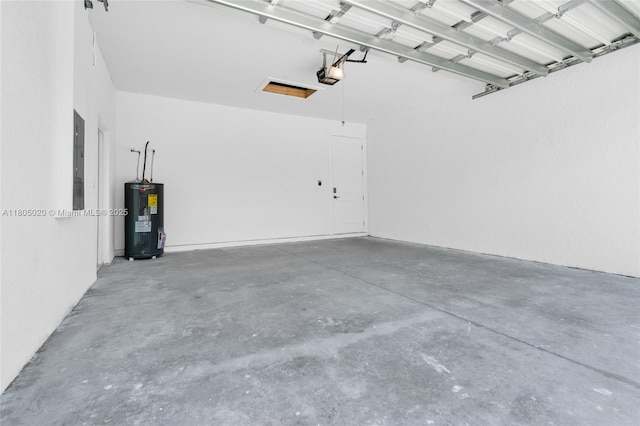418 8th Ave, Lehigh Acres, FL 33972 - garage with water heater and a garage door opener