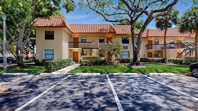 15805 W Waterside Cir Unit 202, Sunrise, FL 33326 - view of property with uncovered parking