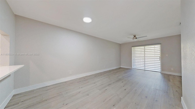15805 W Waterside Cir Unit 202, Sunrise, FL 33326 - unfurnished room with ceiling fan, light wood finished floors, and baseboards