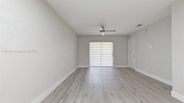 15805 W Waterside Cir Unit 202, Sunrise, FL 33326 - unfurnished room featuring ceiling fan, light wood-style floors, and baseboards