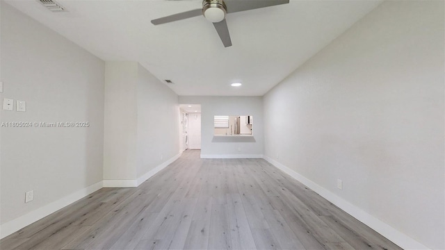 15805 W Waterside Cir Unit 202, Sunrise, FL 33326 - unfurnished living room featuring ceiling fan, wood finished floors, and baseboards