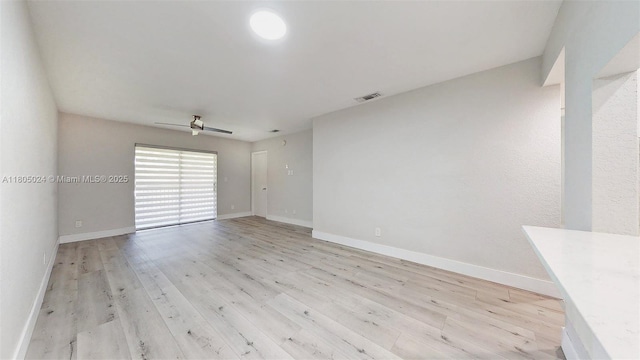 15805 W Waterside Cir Unit 202, Sunrise, FL 33326 - empty room featuring ceiling fan, light wood-type flooring, and baseboards