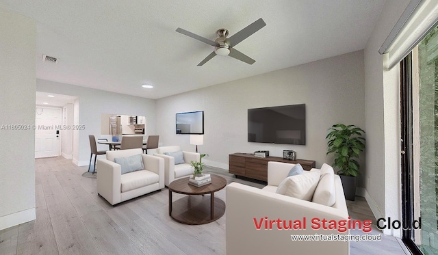 15805 W Waterside Cir Unit 202, Sunrise, FL 33326 - living area featuring ceiling fan, baseboards, light wood-type flooring, and recessed lighting