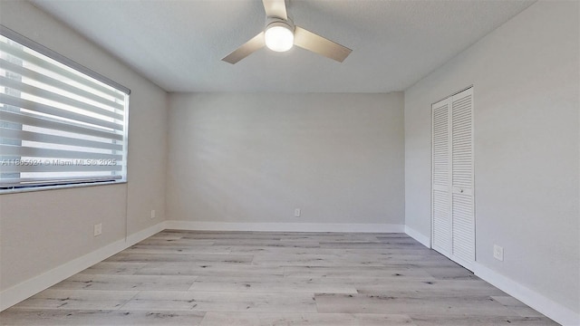 15805 W Waterside Cir Unit 202, Sunrise, FL 33326 - unfurnished bedroom with light wood-style floors, a closet, and ceiling fan