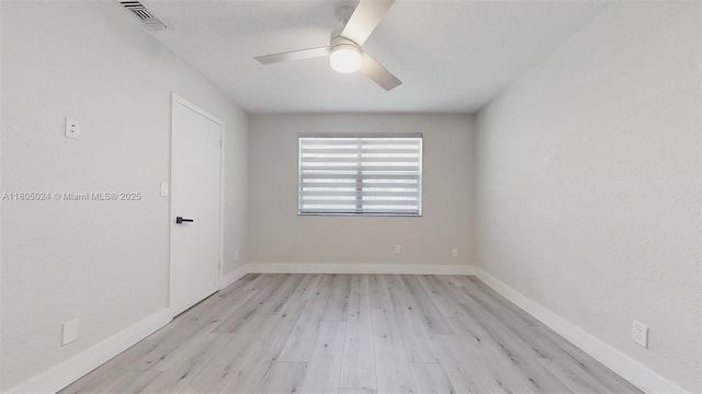 15805 W Waterside Cir Unit 202, Sunrise, FL 33326 - empty room with light wood finished floors, ceiling fan, and baseboards