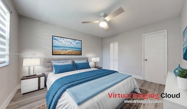 15805 W Waterside Cir Unit 202, Sunrise, FL 33326 - bedroom with light wood-type flooring, ceiling fan, and baseboards