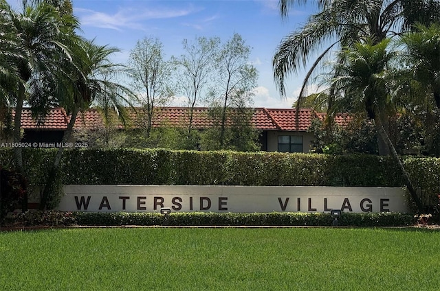 15805 W Waterside Cir Unit 202, Sunrise, FL 33326 - community sign with a yard