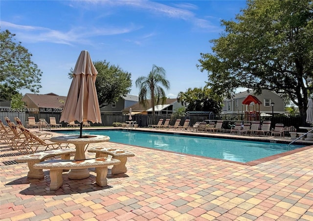 15805 W Waterside Cir Unit 202, Sunrise, FL 33326 - community pool featuring a patio and fence