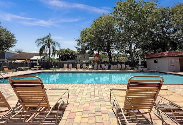 15805 W Waterside Cir Unit 202, Sunrise, FL 33326 - community pool with fence and a patio area