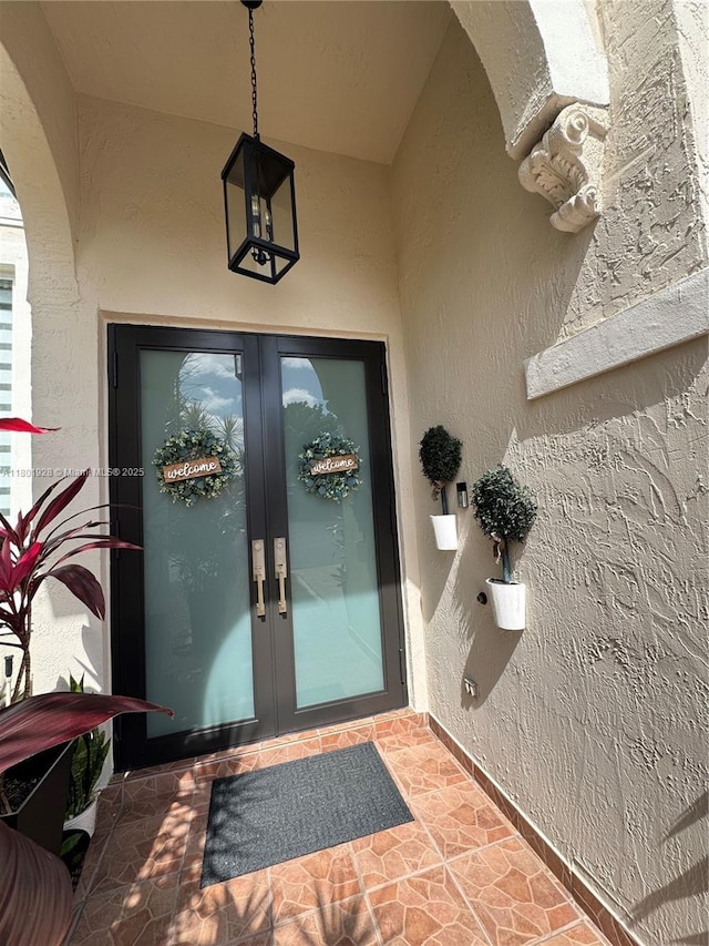 4892 NW 109th Pl, Doral, FL 33178 - entrance to property featuring french doors and stucco siding