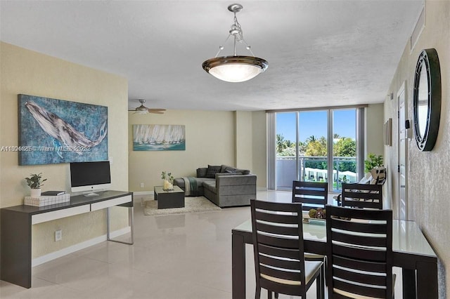 3001 S Ocean Dr Unit 321, Hollywood, FL 33019 - dining room featuring tile patterned floors, baseboards, and ceiling fan