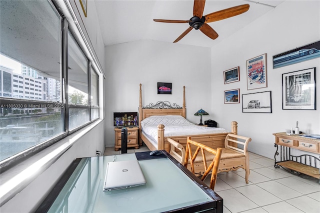 214 Poinciana Dr Unit 204, Sunny Isles Beach, FL 33160 - bedroom with vaulted ceiling and light tile patterned floors