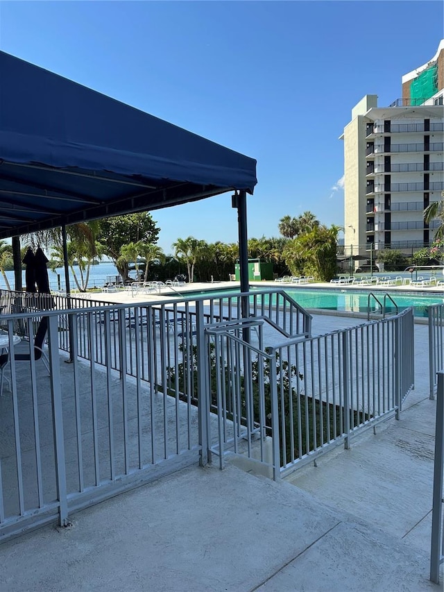 880 NE 69th St Unit 7Q, Miami, FL 33138 - community pool with a patio area