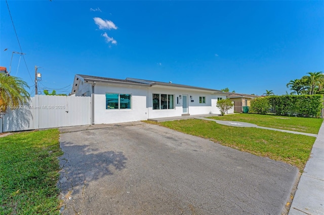 2023 SW 99th Ave, Miami, FL 33165 - ranch-style house featuring driveway and stucco siding
