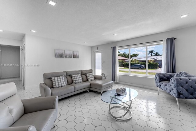 2023 SW 99th Ave, Miami, FL 33165 - tiled living room with recessed lighting and baseboards