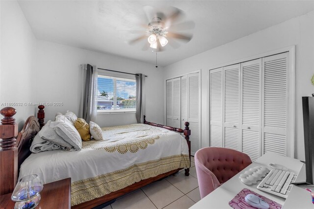 2023 SW 99th Ave, Miami, FL 33165 - bedroom with two closets, tile patterned flooring, and ceiling fan