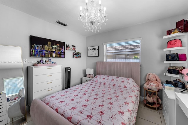 2023 SW 99th Ave, Miami, FL 33165 - bedroom featuring light tile patterned floors and a chandelier