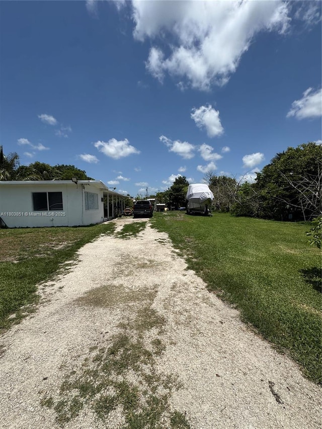 554 SW 7th St, Florida City, FL 33034 - view of yard featuring dirt driveway