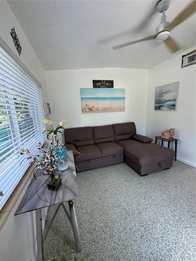 554 SW 7th St, Florida City, FL 33034 - living room featuring ceiling fan, baseboards, and speckle patterned floor