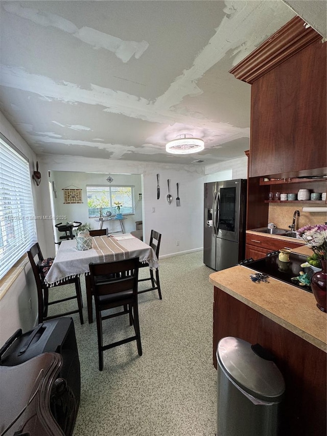554 SW 7th St, Florida City, FL 33034 - dining room featuring baseboards