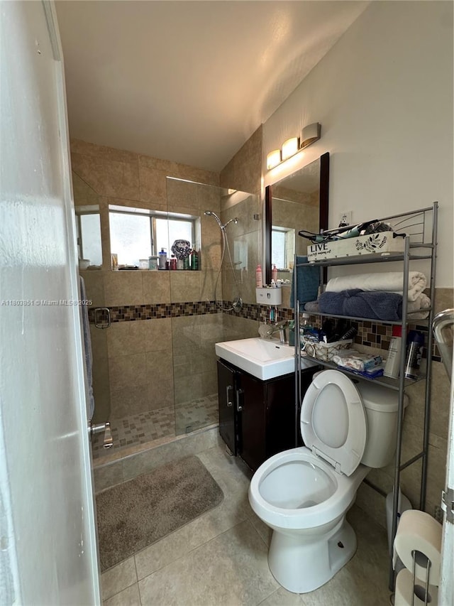 554 SW 7th St, Florida City, FL 33034 - full bathroom with a shower stall, vanity, tile patterned floors, and toilet