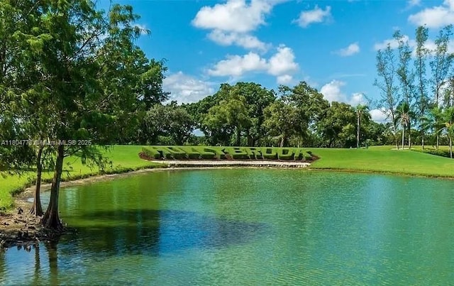 8930 S Hollybrook Blvd Unit 210, Pembroke Pines, FL 33025 - water view with a tree filled landscape