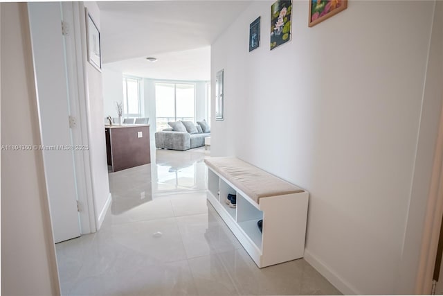 1900 N Bayshore Dr Unit 1918, Miami, FL 33132 - corridor featuring light tile patterned floors and baseboards