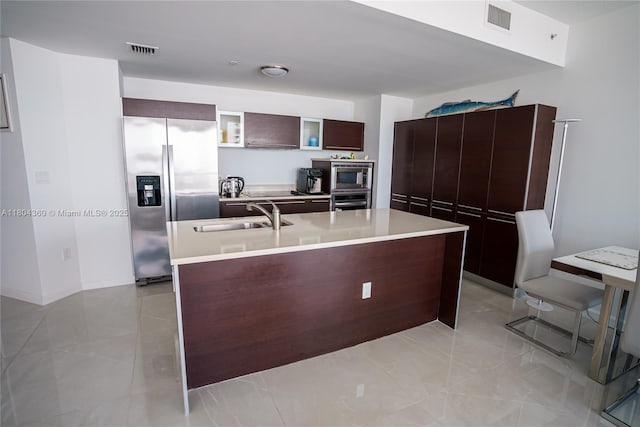 1900 N Bayshore Dr Unit 1918, Miami, FL 33132 - kitchen featuring appliances with stainless steel finishes, custom range hood, modern cabinets, and light countertops