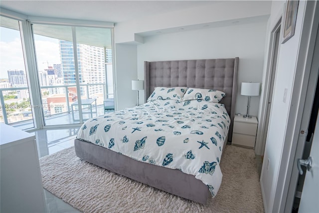 1900 N Bayshore Dr Unit 1918, Miami, FL 33132 - bedroom with floor to ceiling windows, a city view, and carpet flooring