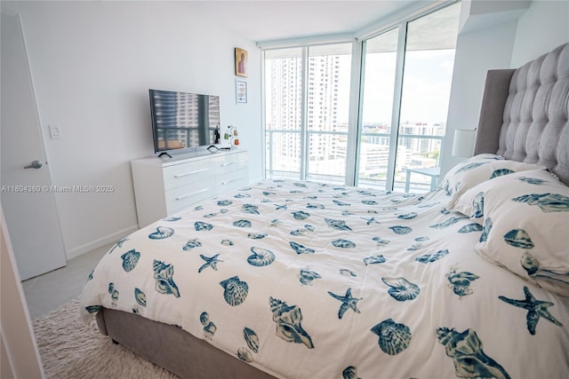 1900 N Bayshore Dr Unit 1918, Miami, FL 33132 - bedroom with access to outside, light carpet, and expansive windows