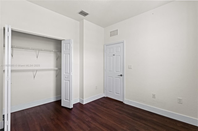 10611 W 33rd Ct, Hialeah, FL 33018 - unfurnished bedroom featuring wood finished floors and a closet