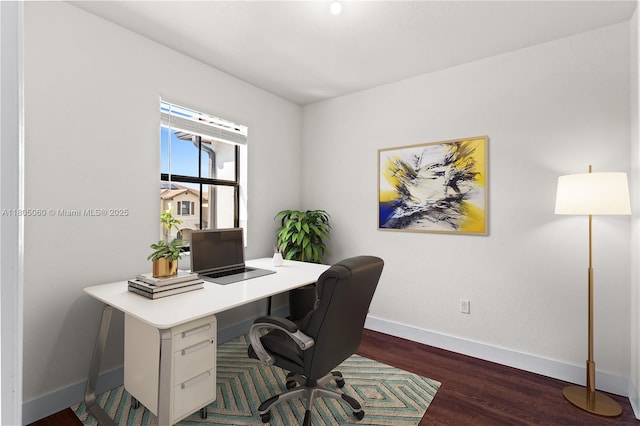 10611 W 33rd Ct, Hialeah, FL 33018 - office area with baseboards and wood finished floors