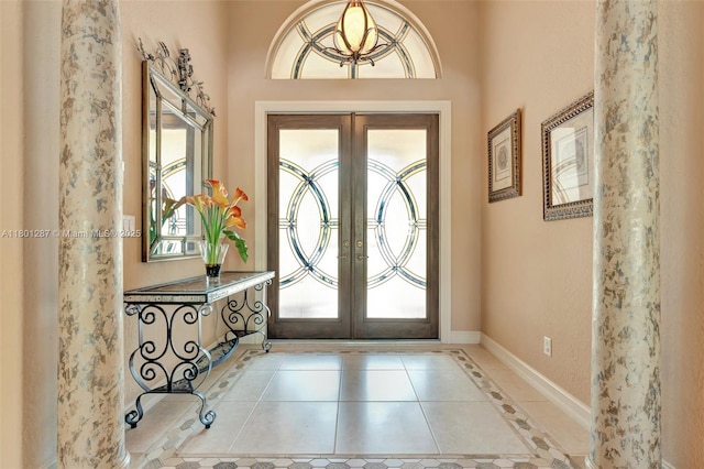12668 NW 74th Pl, Parkland, FL 33076 - tiled foyer entrance featuring french doors and baseboards