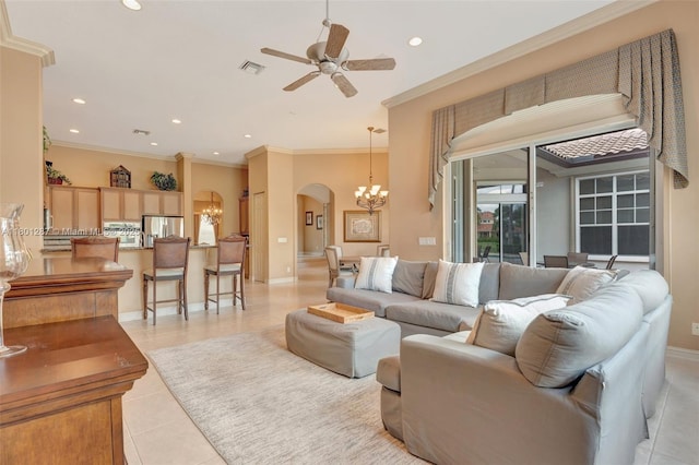 12668 NW 74th Pl, Parkland, FL 33076 - living room featuring a chandelier, arched walkways, recessed lighting, ceiling fan, and light tile patterned flooring
