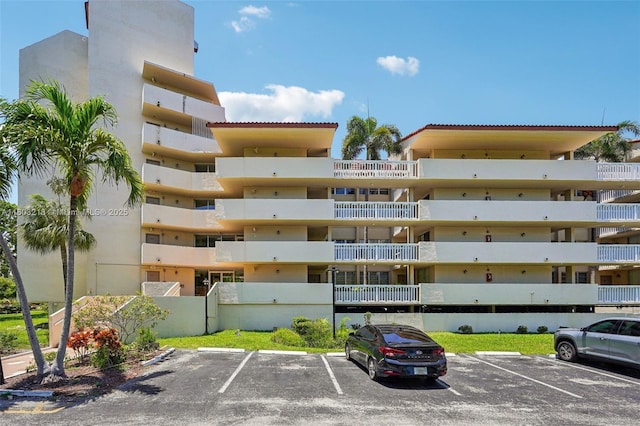 7081 Environ Blvd Unit 243, Lauderhill, FL 33319 - view of apartment building / complex featuring uncovered parking