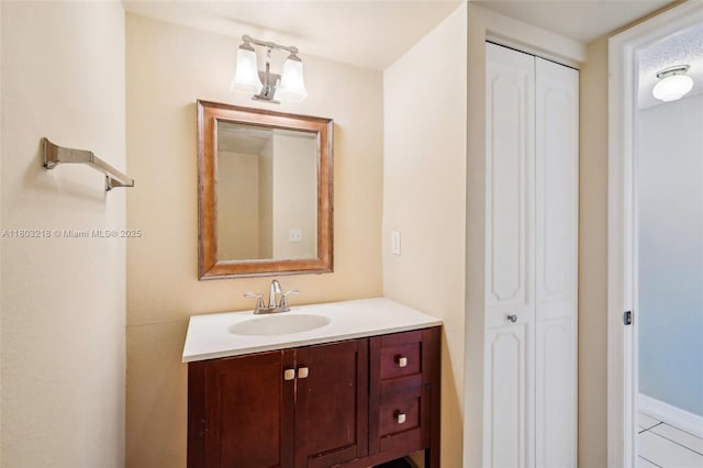 7081 Environ Blvd Unit 243, Lauderhill, FL 33319 - bathroom with vanity, a closet, and tile patterned floors